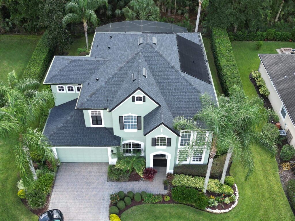 Florida home with new roof installed by Eave & Gable Roofing.