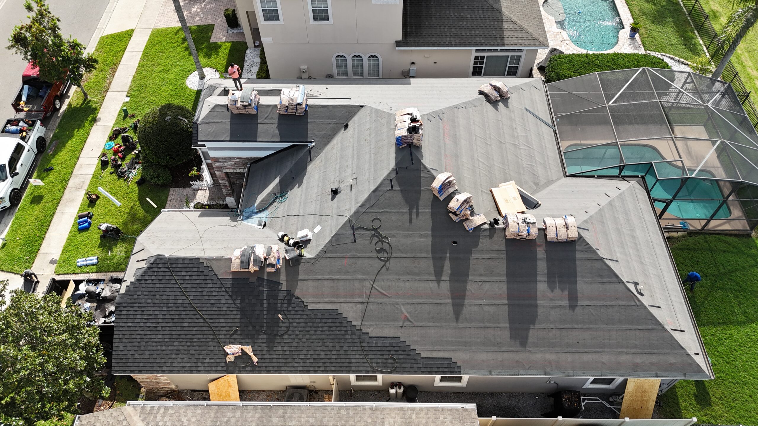 Image shows Osceola County (Kissimmee) Florida home undergoing roof replacement.