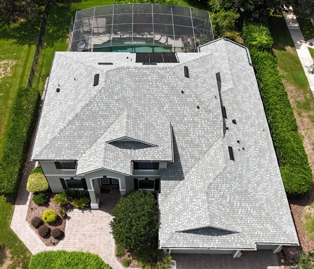 Image shows home in Osceola County Florida with a new CertainTeed shingle roof by Eave & Gable Roofing
